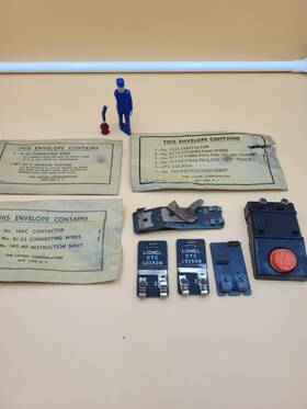 5425-15 Lionel Trains Empty Envelopes And Extras Plus Signalman Figure Connector Switch