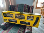 Caterpillar Construction Express Toy Train Set 5 Cars 14' Of Track 1992. Fixed Price $195.00.