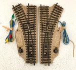 2X Marklin Ho Track Pieces, Left & Right Switch / Turn Out (5118 5119). Fixed Price $20.00.