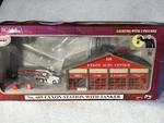 Cool Model Power Exxon Station With Tanker Lighted People Ho. Fixed Price $45.00.
