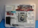 Hawthorne Village Bachmann Depressed Flatbed Farmall Tractor & Transformer. Fixed Price $55.00.
