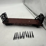 Lionel Gauge Brown Pennsylvania Bulkhead Flatcar With Stakes #387144. Fixed Price $29.99.