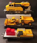 Caterpillar Construction Express Motorized Toy State Locomotive Train Truck. Fixed Price $24.97.