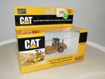 Norscot 55156 Cat CP-563E Padfoot Drum Vibratory Soil Compactor, 1:87 Scale. Fixed Price $25.00.
