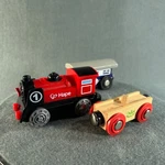 Hape Wooden Railway Battery Powered Engine Train And Cargo Tender. Fixed Price $15.00.