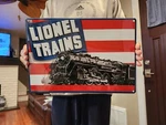 (1) Brand New Ande Rooney Lionel Trains Engine & Flag Heavily Embossed Tin Sign. Fixed Price $19.95.