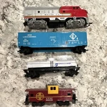 Santa Fe & Erie Lackawanna Locomotive, Boxcar, Tank Caboose Model Train Lot. Fixed Price $60.00.