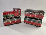 Christmas Train North Pole Express Locomotive, Elves Workshop, Toys, Caboose Tin. Fixed Price $46.39.