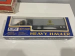 Brand Nib K-line Electric Trains Heavy Hauler Tractor Trailer Flat Car Set Erie. Fixed Price $55.00.