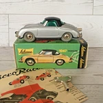 Schuco Micro Racer 1047 Porsche 356 With Key And Box - Silver/black. Fixed Price $85.00.