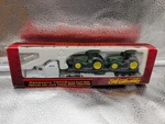Ertl Ho Model 5459: Kenworth T600B Semi W/ 2 John Deere 8300 Tractors. Fixed Price $39.00.