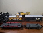 1992 Toy State Caterpillar Motorized Train Boxcar Flatcar Caboose Track. Fixed Price $22.50.
