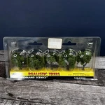 Woodland Scenics TR1502 1-1/4"-2" Medium Green Model Trees (pack Of 5). Fixed Price $10.00.
