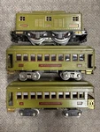 + Lionel Prewar Standard Tinplate Olive Green 8E Locomotive 2 Car Passenger Set. Fixed Price $295.00.