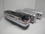 Tomy Tomica World Amtrak Engine Train & Coaches Tested Works Runs Rough. Fixed Price $179.95.