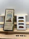 Vintage Postage Stamp Trains Aurora No 4720 Steam Frieght Set. Fixed Price $35.00.