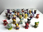 Disney Vinylnation Assorted Figurines Lot Of 32 Marvel Star Wars. Fixed Price $65.00.