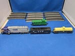 Maisto Die-cast Trains With 11 Curved Track. Fixed Price $12.99.