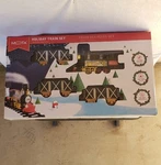 Mota Classic Holiday Christmas Train Set Real Smoke, Lights & Sound Full. Fixed Price $58.00.