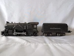 Lionel Gauge #249E Steam Locomotive Pre-war, Gunmetal & Whistle Tender #265W. Fixed Price $180.00.