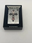 Zippo 28874 Cross-adorned Skull High Polish Chrome. Fixed Price $27.59.
