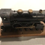 Antique Lionel 384-E Steam Locomotive Train Engine W/ Wooden Display Base. Fixed Price $200.00.