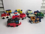 12 Pcs 2003-2006 Fisher Price Geo Trax Push Train Cars Engines Fire Truck.... Fixed Price $39.99.