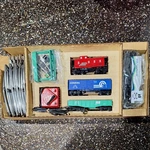 Lionel 1264 Nibco - #8182 Switcher + Conrail Boxcar 9035, Penn Central Gondola. Fixed Price $300.00.