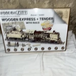 Wooden Express + Tender With Rails Mechanical Model Kit. Fixed Price $59.99.