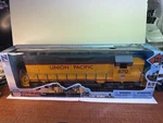 New Ray 1/32 Union Pacific Up Locomotive W/ Lights And Sounds & Display Track. Fixed Price $99.77.