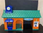 Lionelville Little Lines Golden Bell Train Station & Cafe Playset. Fixed Price $19.99.