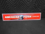 Ande Rooney American Flyer Trains Sign Porcelain Enamel Red 21" X 4". Fixed Price $27.95.