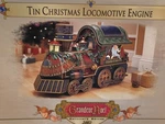 Grandeur Noel Tin Christmas Locomotive Engine Collectors Edition Train 27". Fixed Price $64.90.