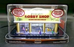 Menards 275-0617 Grandpa Jack's Hobby Shop Pre Built Lighted Building. Fixed Price $69.99.