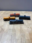 Vintage Ho Scale Mixed Brand Lot Of 4 Model Train Tankers Weathered Shell. Fixed Price $15.00.