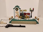 New Bright Holiday Express Musical Clock Tower Station With Bear No. 383-10. Fixed Price $89.00.