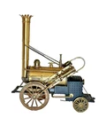 Model Of Stephenson's 1829 Rocket Steam Locomotive W/ Radio. Fixed Price $50.00.