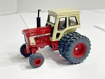 1/64 Scale Ertl International Harvester 1466 Tractor -white Cab Dual Rear Wheels. Fixed Price $25.00.