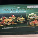 New Bright 1996 The Holiday Express Animated Train Set Model No 380 Opened Box. Fixed Price $295.00.