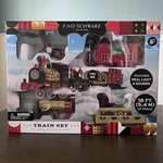 Fao Schwarz Holiday Train Motorized Set 30 Pieces With Light Sound New. Fixed Price $139.99.