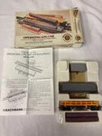 Bachmann Ho Operating Log Car. Fixed Price $25.00.