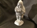 Lot# 1466. Vintage Northwest Coast Metal Alloy Seal Hunter. Fixed Price $45.00.