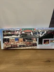 New Bright 1996 Dickensville Christmas Train Set Original Box No 174W. Fixed Price $100.00.