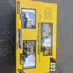 Caterpillar Construction Express Motorized Toy Train Set Extra Track. Fixed Price $125.00.