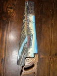 Folk Art Hand Painted Covered Bridge Vintage Saw Signed By Paula Naffziger. Fixed Price $50.00.