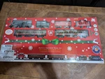 Lionel Christmas 31- Piece Train Set Sealed. Fixed Price $31.99.