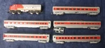 Trix Scale Santa Fe Diesel Locomotive And Passenger Cars. Fixed Price $79.99.