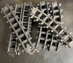 Toy State 1992, 11 Curved & Straight Black Plastic Train Track. Fixed Price $29.99.
