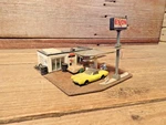 Vintage Ho Scale Model Train Pre-built Exxon Gas Station. Fixed Price $49.99.