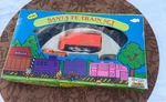 Vintage Mini Santa Fe Battery Operated 12-PIECE Train Set. Fixed Price $25.00.